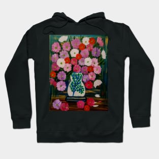 A beautiful bouquet of mixed flowers in a white vase with a tree painted on it Hoodie